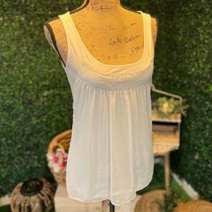 “New York & Company” white sleeveless blouse with sheer front, size Small